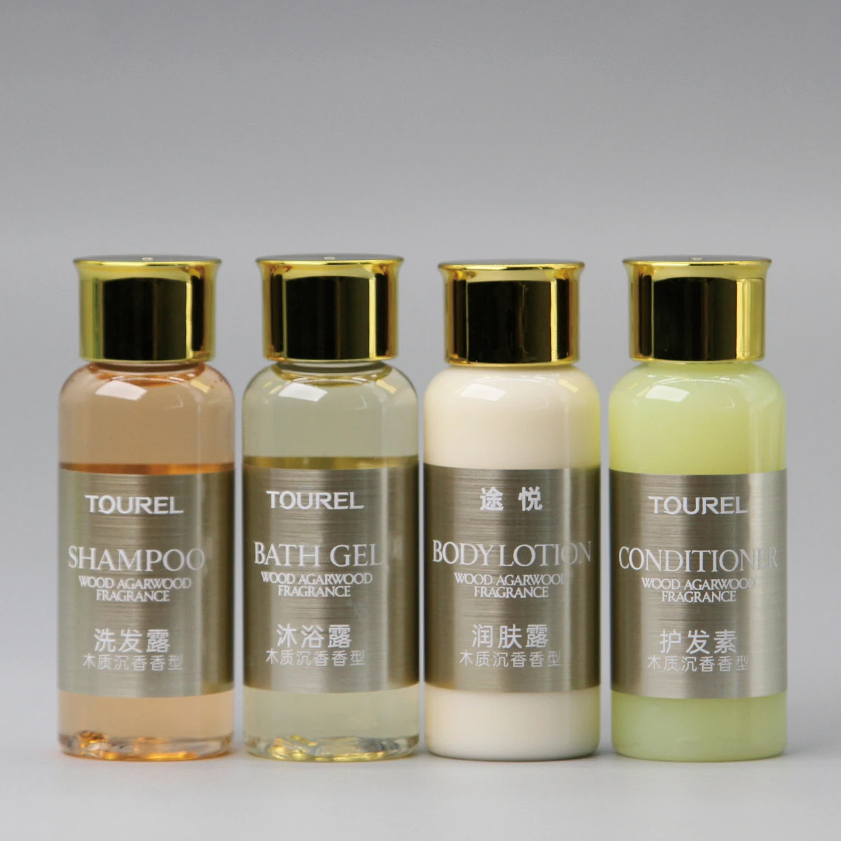 Set de artículos de tocador con botellas pequeñas de gel de champú para hotel, champú y acondicionador para hotel